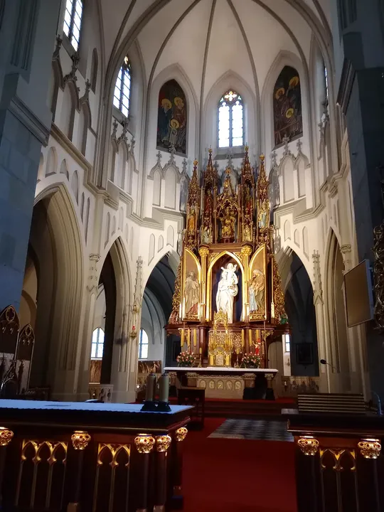 The high altar beneath Gothic-style vaulting at Saint Joseph’s Church, Podgórze