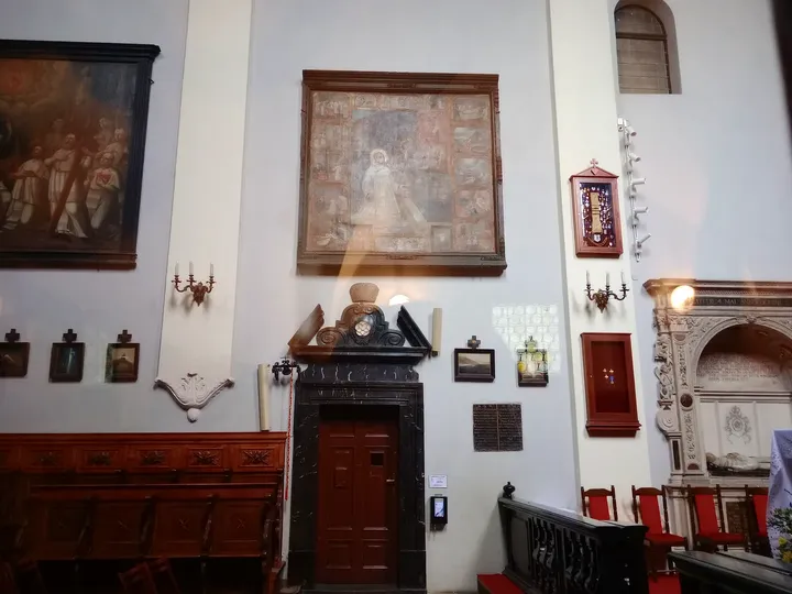 Interior benches and memorial plaques at Saint Mark’s Church, Kraków