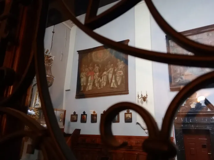Prayer space through the decorative grille at Saint Mark’s Church, Kraków