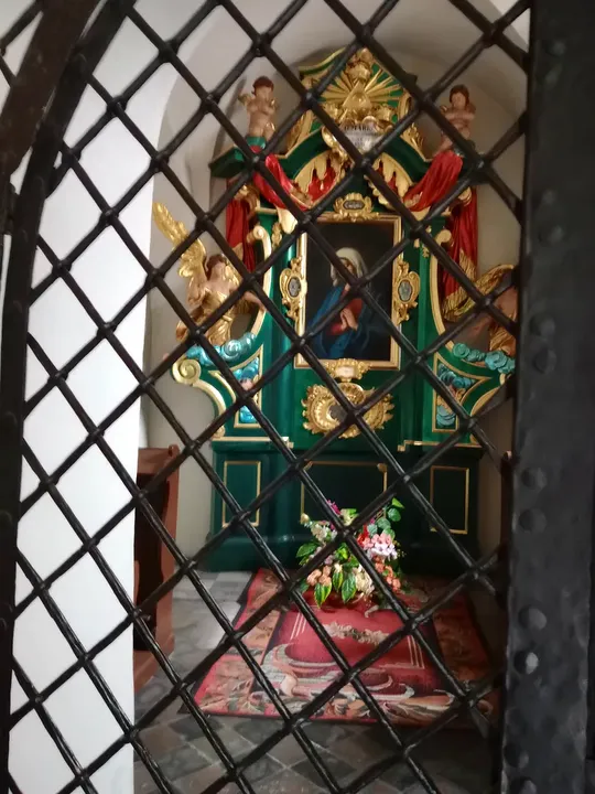 Coloured window seen more closely at Saint Mark’s Church, Kraków