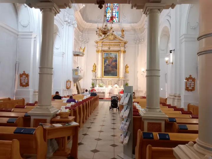 Pews beneath the high windows at Saint Martin’s Church, Kraków