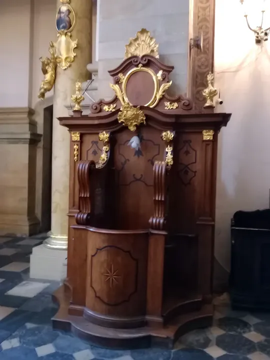 Carved wood beside the aisle at Saints Peter and Paul Church, Kraków