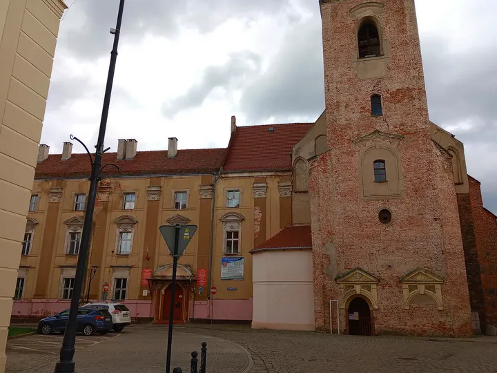 Church beside the neighbouring frontage at Saints Peter and Paul Church, Żagań