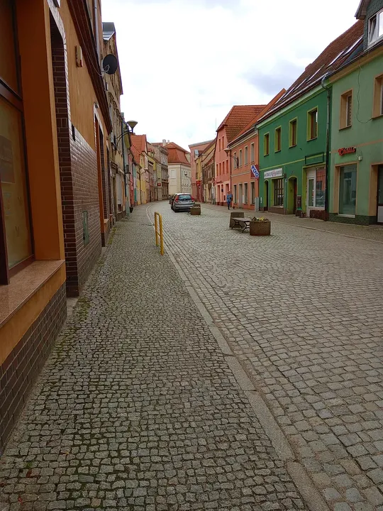 Colourful frontages along the pedestrian lane at Słowiański Square, Żagań
