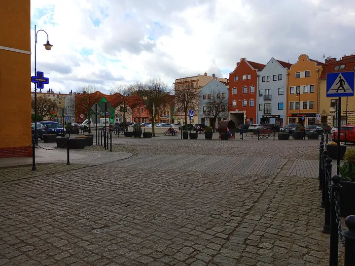 Wide view across the paved space at Słowiański Square, Żagań