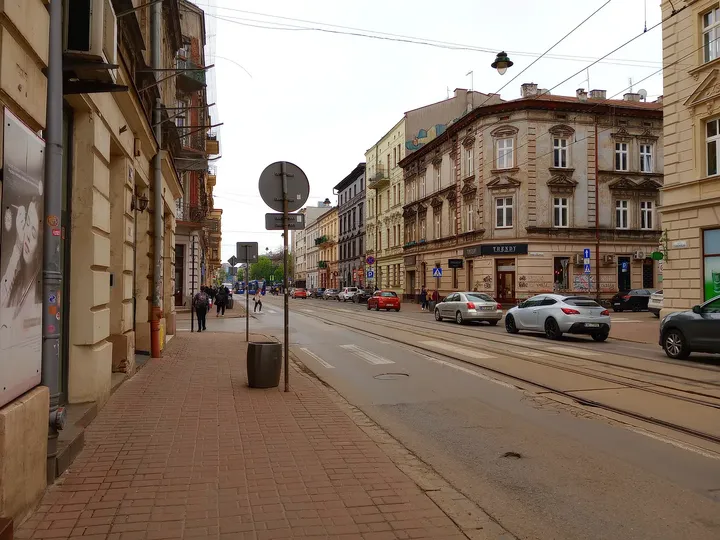 Corner buildings above the tram tracks at Starowiślna Street