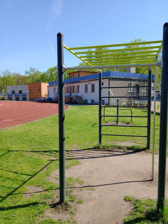 Exercise frame beside the stadium track at Sulechowska stadium outdoor exercise ground