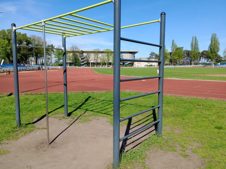 Tall ladder at the edge of the field at Sulechowska stadium outdoor exercise ground