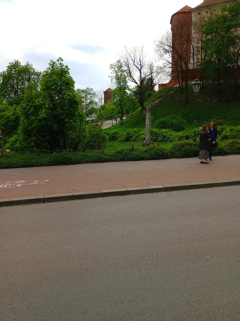 The stone figure beside the Wawel approach at Światowid sculpture