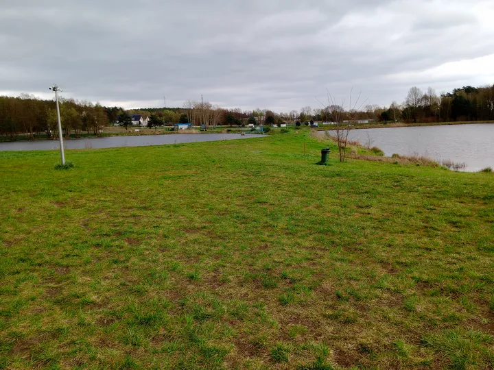 Open recreation ground beyond the grass at Świdnica outdoor exercise ground