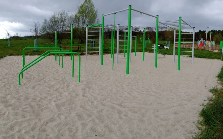 Wide view across the equipment area at Świdnica outdoor exercise ground
