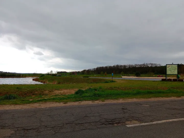 Water beyond the approach road at Świdnica reservoir