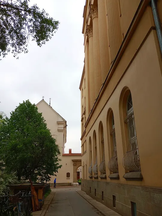 Low arches along the frontage at Świętego Marka Street
