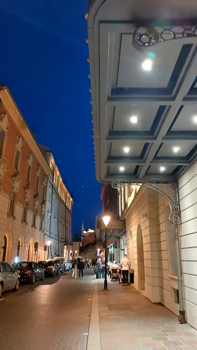 Street frontage in the evening at Świętego Tomasza Street
