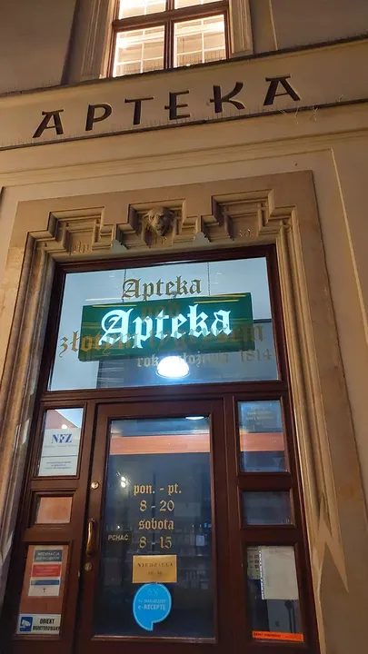 A pharmacy doorway beside the square at Szczepański Square