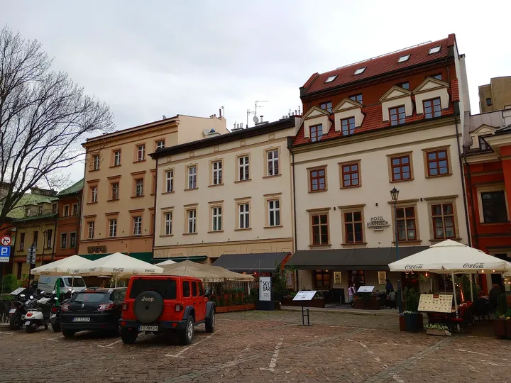 Long frontage beside outdoor tables at Szeroka Street