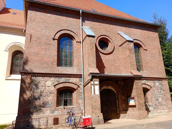 Arched palace entrance at Town Park, Sława