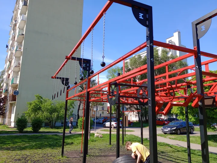 Overhead bars viewed from below at Tysiąclecia Park outdoor exercise ground