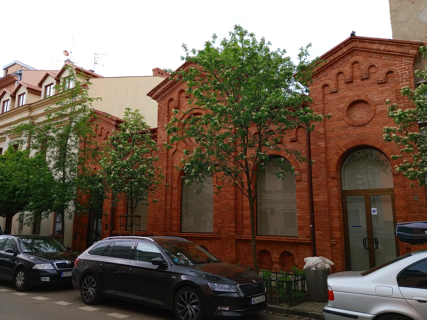 A red-brick frontage beside the street at Węgierska Street