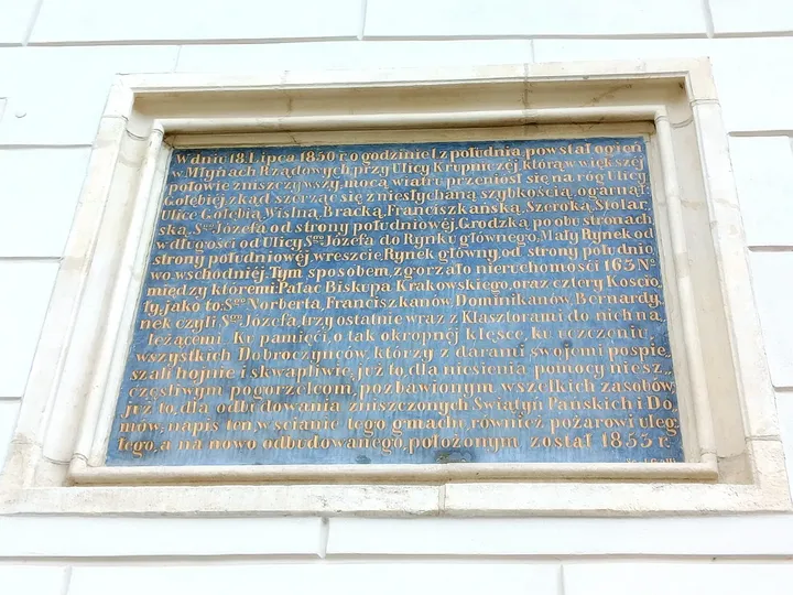 Commemorative panel on the building wall at Wentzl Restaurant