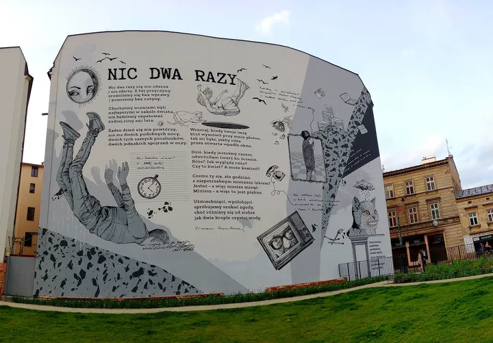 Lettering and drawings on the wall at Wisława Szymborska Park