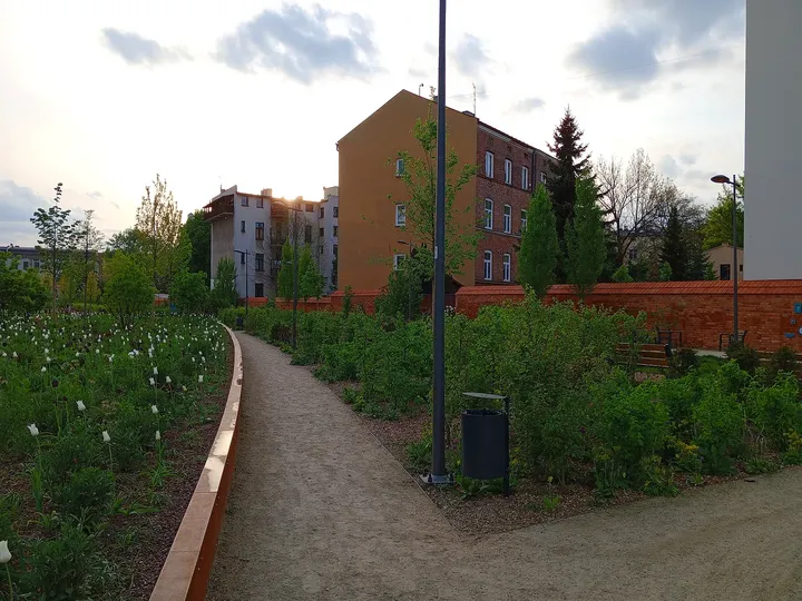 Path through the small urban garden at Wisława Szymborska Park