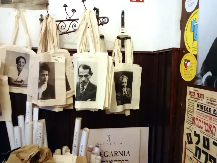 Portrait photographs in the bookshop at Wolf Popper Synagogue and Austeria