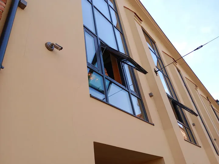 Tall windows along the restaurant frontage at Woosabi