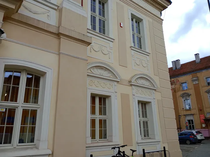 The pale façade and window surrounds at Żagań Municipal Office