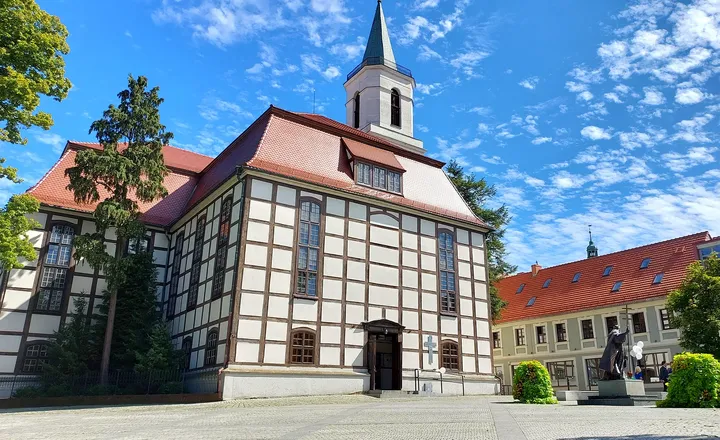 Timber-framed church and its tower at Zielona Góra Old Market Square